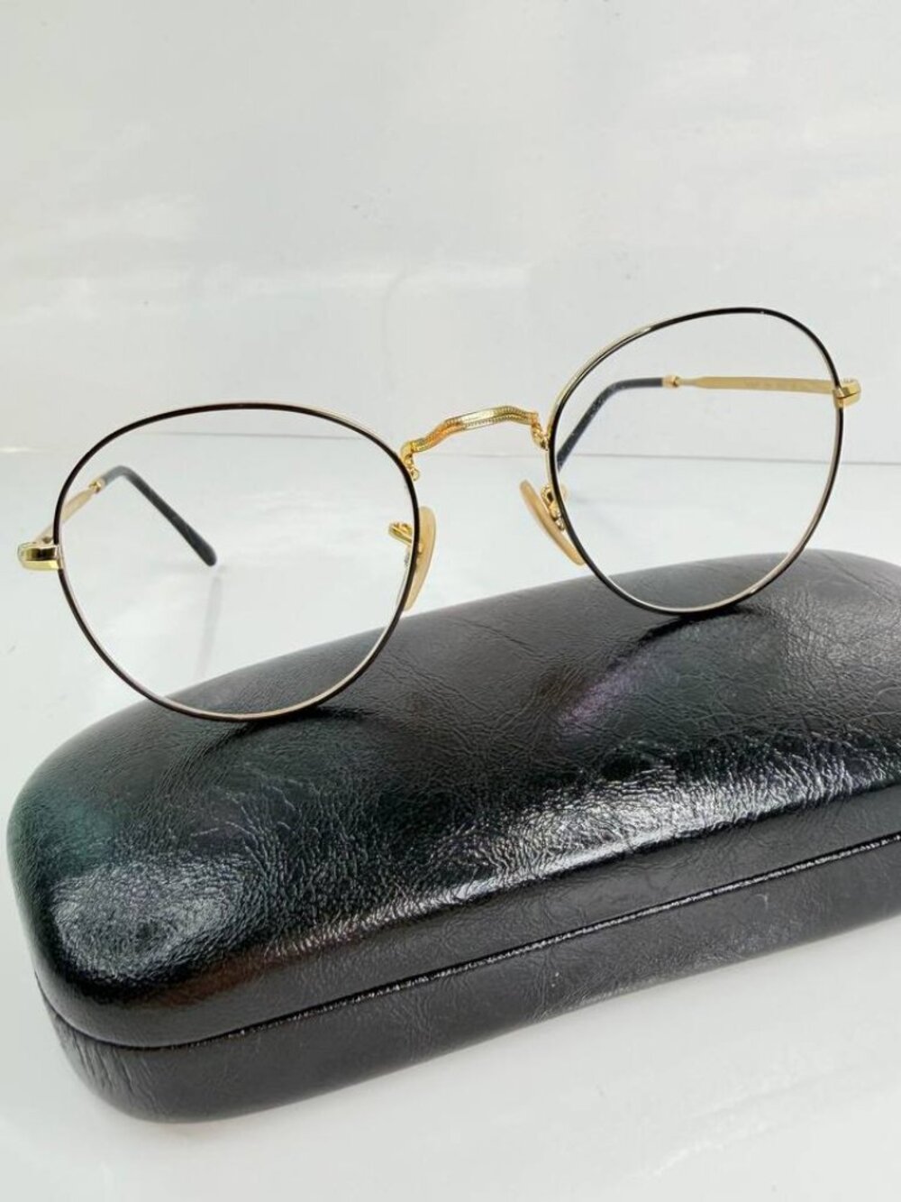 Ray-Ban RB3582V Gold Round Eyeglasses – 49-20-140